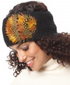Feathered friend. Make this sweet feather-accented knit headband by David & Young your cozy companion for winter weather style.