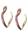 Venomous fashion, by RACHEL Rachel Roy. Glittering snakes add fierce style to this set of hoop earrings embellished with glass stones and purple epoxy. Set in worn gold tone mixed metal. Approximate diameter: 2 inches. Approximate drop: 1-3/4 inches.