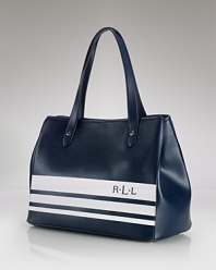 Lauren Ralph Lauren puts a sporty spin on the classic tote bag with bold stripes. A roomy interior and reinforced bottom ground this piece, making it a chic daytime choice.