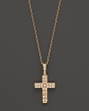 Petite diamond pavé-set cross pendant set in 14K yellow gold.