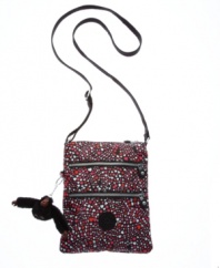 It's love at first sight with this adorable crossbody bag by Kipling. Two exterior pockets, an all-over heart print and a cute monkey keychain add fun fashion to this functional design.