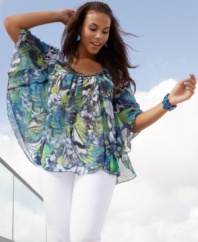 Enliven your summer wardrobe with Style&co.'s batwing sleeve plus size top, broadcasting a bold print!
