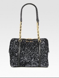 Allover sequined design with leather trim and chain link straps.Double leather and chain link shoulder strap, 10½ dropTop zip closureOne inside zip pocketTwo inside open pocketsSatin lining9½W X 7¼H X 6DMade in Italy