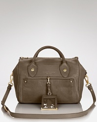 MARC BY MARC JACOBS puts a fresh spin on it's classic satchel with tonal leather. Designed to hold a prep's essentials, this carryall is top performer in the day-to-night department.