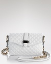 Marc Jacobs' quilted leather crossbody bag adds a contemporary kick. Shake up your palette and carry this striking style as a graphic contrast to slick leathers and monochrome looks.