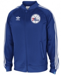 Get in the game. This retro-style Philadelphia 76ers track jacket from adidas is the ultimate fan gear.