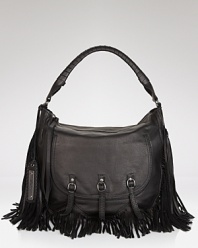 Sam Edelman delivers its latest must-have accessory with this fringed leather hobo. Intricately crafted and detailed with fringe, this carryall rises to the top of our it list.