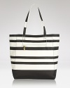 Stripes go from seaworthy to statement making with this leather tote from Pour La Victoire. It exudes carryall cool whether you're on-duty or dashing downtown for drinks.