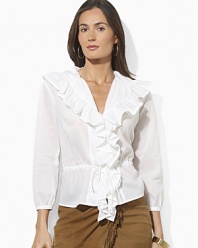 Delicate gathering and a breezy woven cotton construction lend feminine inspiration to a soft blouse.