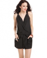 A silky romper that seamlessly transitions into the night, this style from GUESS? is the epitome of sleek-chic! With its wrap-style top and slouchy-cool fit, this one-piece is the ideal mate to a pair of sexy heels!