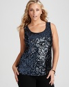 Glam a little or a lot in this Calvin Klein sequin tank. Flaunt on its own for date night or pare down with an essential blazer at the office.