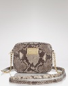 Compact style goes exotic with this snake-embossed leather crossbody from MICHAEL Michael Kors. Sized to meet day-to-night demands, it's positively poisonous over an L.B.D.