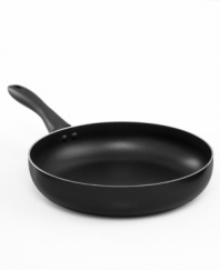 Step it up in the kitchen with the nonstick excellence of this essential fry pan. A durable aluminum core conducts heat like a seasoned professional, evenly and quickly heating the pan for remarkably healthy meals every time. Limited lifetime warranty.