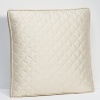 This diamond stitched decorative pillow evokes an air of old world glamour. Coordinates well in any classic home.
