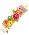 A brilliant bouquet! Colorful flowers of all shapes and sizes adorn this wide chain bracelet from Betsey Johnson. Embellished with vividly hued crystals and an adorable ladybug, it's crafted in gold tone mixed metal. Includes a toggle closure. Approximate length: 8 inches.