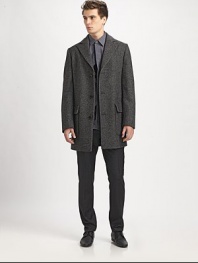 A sleek, single-breasted virgin-wool coat with a touch of stretch for a great fit.Notched collarButton frontPatch pocketsBack ventAbout 33 from shoulder to hem95% virgin wool/5% polyamideDry cleanMade in Italy