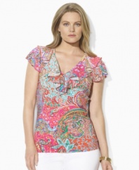 A chic plus size V-neck jersey top is trimmed with a flourish of ruffles at the neckline and delicate flutter sleeves, from Lauren by Ralph Lauren.