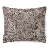 Harkening back to a more primitive time, this tribal tattoo sham livens up any room with a pop of daring print.