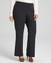 These Tahari Woman trousers flaunt a flattering banded waist and straight leg silhouette for a smart workday look.