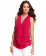 MICHAEL Michael Kors' beautiful petite blouse features a stunning V-shaped tier at the front and an amazing draped fit. The bright color is on-trend for pairing with white skinnies and shiny flats.