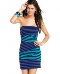 Panels of alternating color drape asymmetrically across a hot-weather dress that pops! From Material Girl.