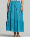 DKNYC's go-anywhere, works-with-everything maxi skirt brings ease to your favorite summer looks.