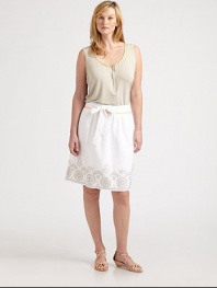You will instantly fall in love with the elegant embroidery on this linen skirt. Its flared silhouette offers a flattering fit as its contrast piping completes this feminine look.Contrast piping at waistbandGrosgrain self-tie beltPleat details at waistSlash pocketsHook-and-eye closureEmbroidered hemConcealed back zipperAbout 22 longLinenDry cleanImported