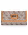 With signature quatrefois G monogram print punctuated with polished silver-tone hardware, this GUESS design is slender enough to slip into a bag and eye-catching enough to carry as a clutch. Plenty of card slots, pockets, and zipped compartment offer exceptional organization within.