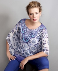 Infuse drama into your casual wardrobe with Style&co.'s batwing sleeve plus size top, embellished by rhinestones.