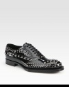 Studded lace-up design with exaggerated sole.Leather upperLeather liningWood/rubber soleMade in Italy