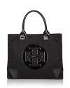 Show off your love for Tory Burch with this oversized nylon tote.