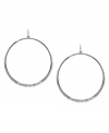 Geometric glam, by Vince Camuto. These classic hoop earrings have been upgraded with rectangular stud detail at the bottom. Crafted in silver tone mixed metal. Approximate drop: 2-1/2 inches.