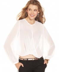 Sheer chiffon drapes softly and forms a novel crisscross design on this dream top from XOXO.