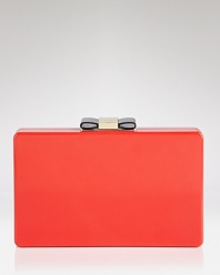 Perfect the hand-off with this clutch from kate spade new york. Boxy and bold, it has just the right amount of ladylike glamor, thanks to it's glossy hue and bow detailing.