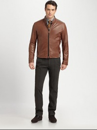 Ribbed knit banding, uniquely placed at the collar, shoulder and hem enhance the blousy effect of this jacket rendered in luxuriously soft lambskin leather.Two-way zip frontStand collarSide slash pocketsRibbed knit collar, shoulder and hem detailFully linedAbout 26 from shoulder to hemLeatherDry cleanImported