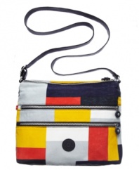 A terrific little crossbody bag for a look that is both functional and fashion forward. Deceptively practical with 2 zipped main compartments and extra zipped pockets on the front.