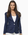 A chic tailored construction and slim pinstripes lend an air of vintage elegance to the Valerine jacket.