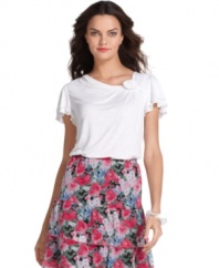 A drapey fit, flutter sleeves and a rosette embellishment combine on this petite top by Elementz. Pair with brightly printed skirts or dark denim and colorful flats for an ensemble in a snap.