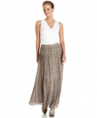A snakeskin print and pleats create a chic effect on MICHAEL Michael Kors' petite maxi skirt. Pair this on-trend piece with a basic top to maximize your look!