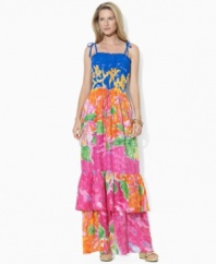 Rendered in airy cotton voile for a full, floaty silhouette, Lauren by Ralph Lauren's petite vibrant maxi dress is designed with a flattering smocked bodice and a two-tiered ruffled hem for whimsical appeal.