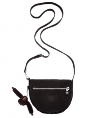 Be part of the cool crowd with this compact crossbody from Kipling that'll take you from work to weekend in style. Strategically placed pockets inside and out keep your essentials safe and secure.