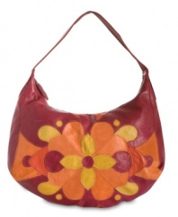 Get your groove-on with this retro hobo from Lucky Brand that'll give any look a lift. Plush leather patchwork in a kaleidoscope of color and floral-geometric pattern is altogether eye-catching, while strategically placed pockets make access to essentials a breeze.