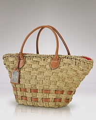 Rising temperatures call for bags like this hand woven tote from Lauren Ralph Lauren. Crafted from corn husk and trimmed in leather, this piece will make a striking contrast to the season's crisp whites.