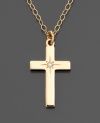 A lovely and meaningful gift, this 14k gold dainty cross pendant features a pretty diamond accent.