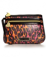 A night-out necessity from Betsey Johnson. Pick your fave print and hit the town with this glam wristlet that stores your cards, cash, camera and much more.