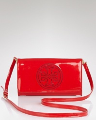 Polish off your look with this glossy, perforated leather clutch from Tory Burch. In a day-to-night-right size and bold hue, it sure to shine on.