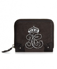 Soft and sassy, this petite velour wallet from Juicy Couture is dressed up in rhinestones and perfectly sized to slip into a pocket or purse. Plenty of interior compartments let you organize cash, cards and coins with ease.