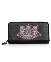 Give it up for fabulous design and exceptional detailing. This plush velour silhouette from Juicy Couture is adorned with their iconic Scottie mascot and trimmed in the softest leather. Features plenty of interior pockets and compartments for cash, coins, cards and ID.