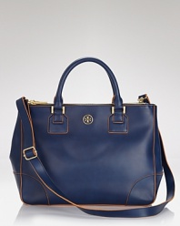 Tory Burch takes on-the-go accessorizing in an uptown direction with this leather tote, boasting a day-right look and room for all the essentials.