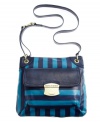 This nautical crossbody by Marc Fisher gets a sophisticated upgrade with polished hardware and a signature plaque at front. An easy access flap pocket and top zip design adds function to this gorgeous look.